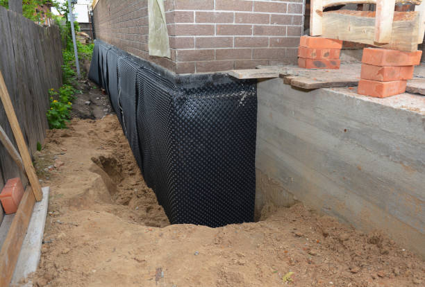 Happy homeowners after waterproofing job in Pound